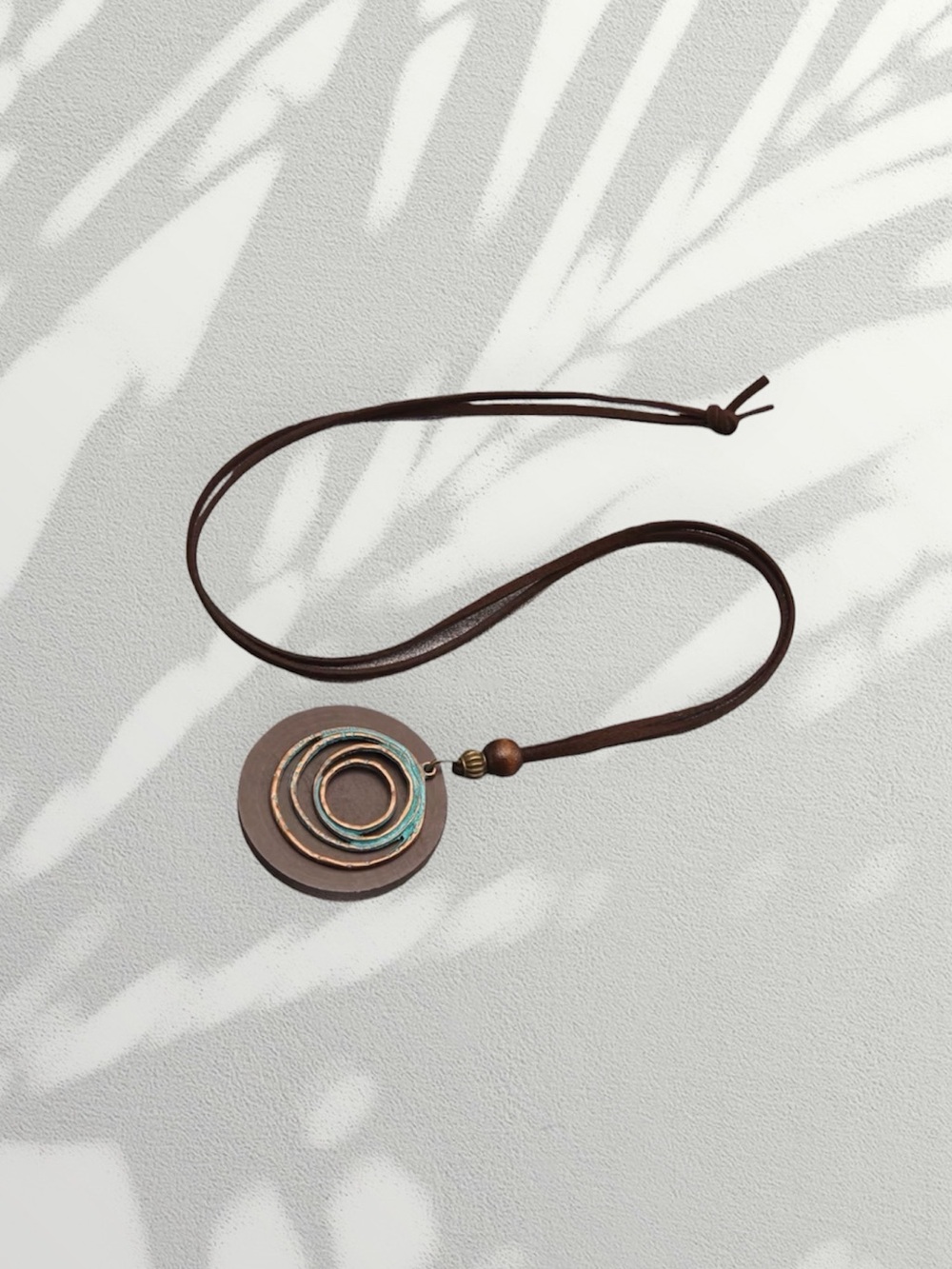 Boho statement necklace with earthy blue/brown wood pendant